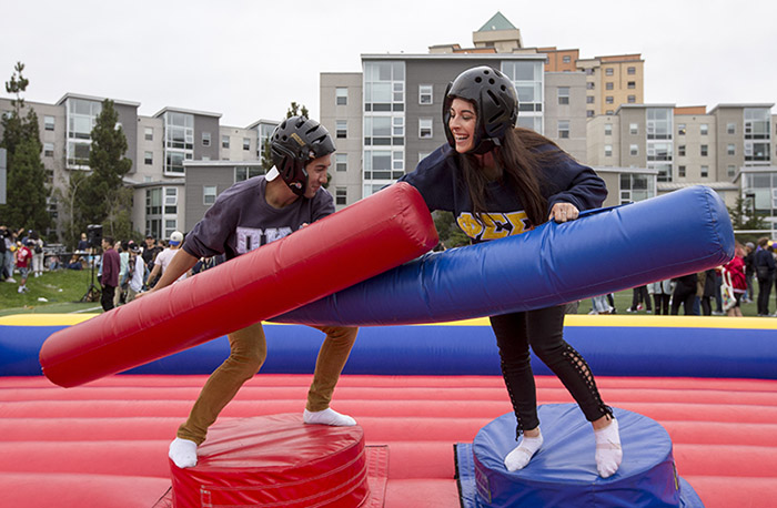 students playing an outdoor game at Gator Fest