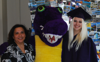 gator mascot with OIP staff and SF State graduate