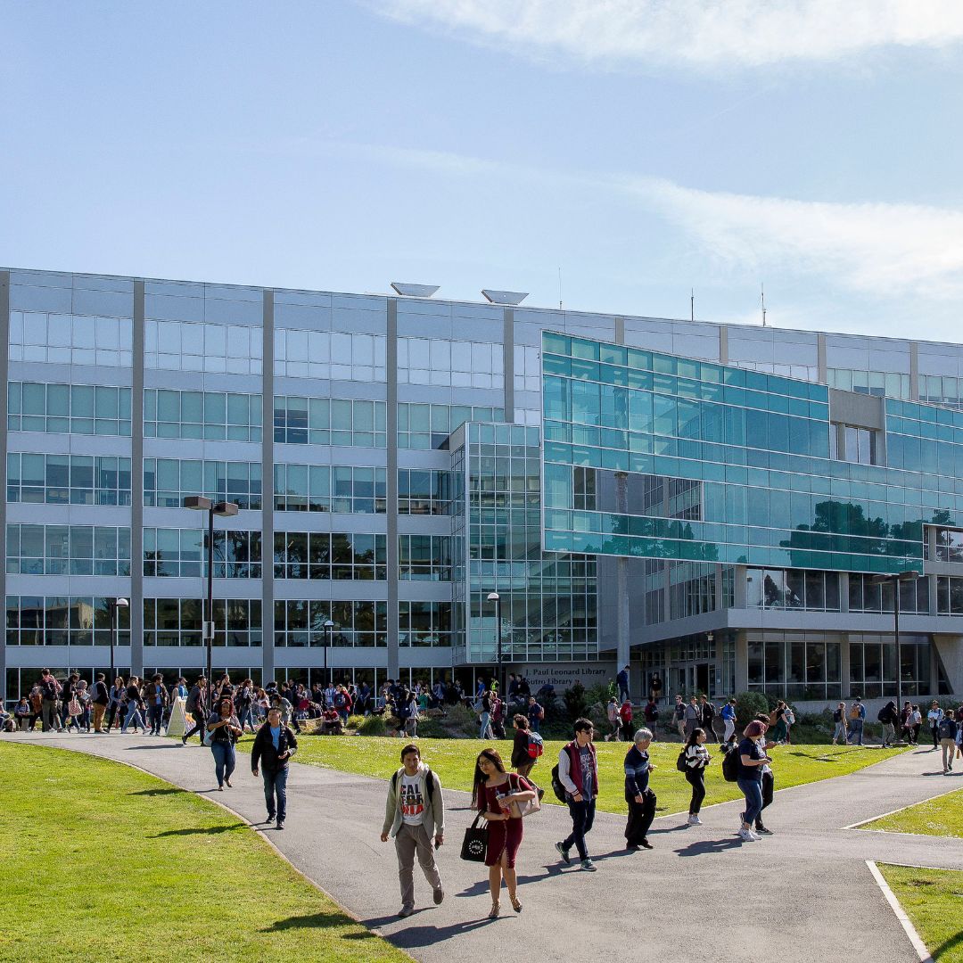 Students walking in front of the library at SFSU