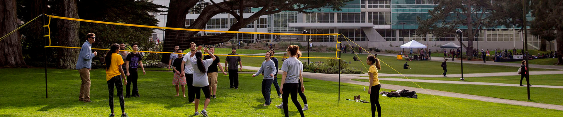 Students playing volleyball on the quad