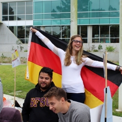 Student holding the German flag