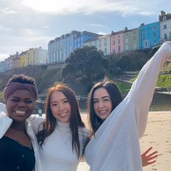 Three girls on a beach in southern England